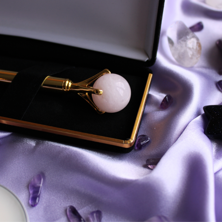 Crystal pen for helping relationships with a Rose Quartz crystal ball on top
